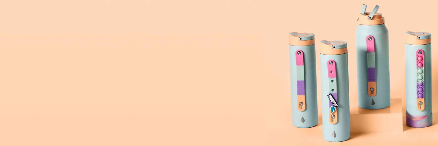 Four insulated water bottles with text on peach background.