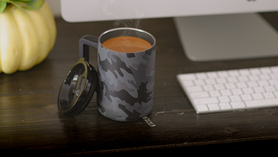 Camo mug on a desk